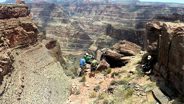 Kirk Johnson rappelling down the Grand Canyon.