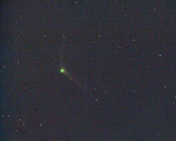 Comet C/2013 US10 Catalina shows off a compact green coma and two tails in this photo taken Nov. 22, 2015, at dawn from Arizona. The green color comes from carbon compounds fluorescing in UV sunlight. Photo by Chris Schur