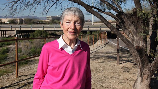 Elizabeth Gunn stands along the Rillito Riverbed and multi-use path. This is the opening scene in the first book in her Tucson mystery series.