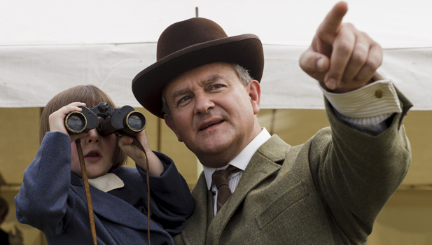 Fifi Hart as Sybbie Branson and Hugh Bonneville as Lord Grantham.