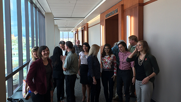 Activists take a photo after judge dismisses five of seven charges against them regarding 2013 protest.