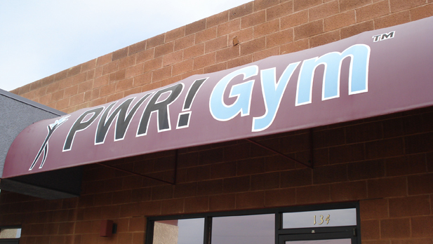 pwr gym sign spotlight