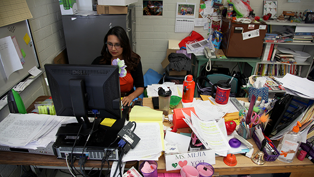 Jessica Mejia stays after school to fulfill state's request for documents from Culturally Relevant Classes.