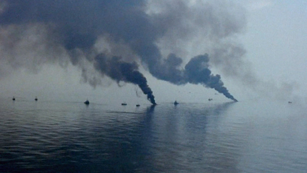 Rig wreckage on fire following the Deepwater Horizon explosion