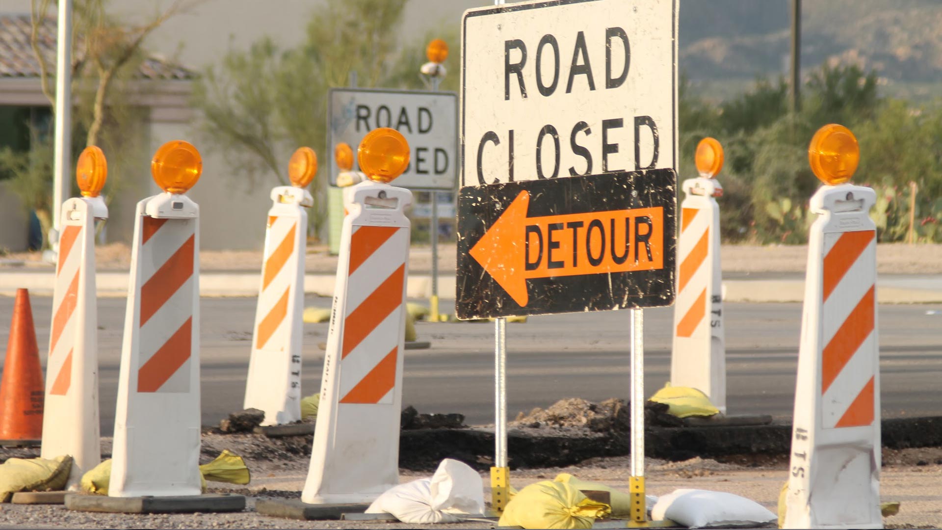 Detour signs at a road construction project.