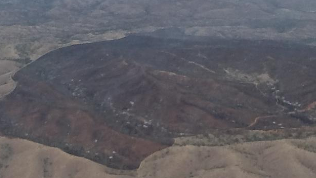 Smoke from Oak Tree Fire (center right) drifts to east. This aerial view is from the south with State Route 83 on left side.