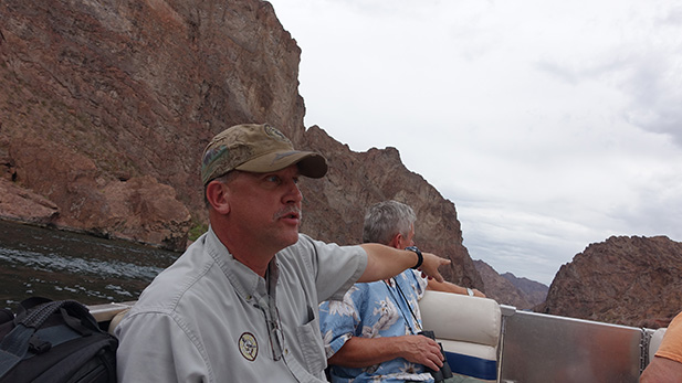 Mocarski instructs participants on how to spot bighorn sheep.