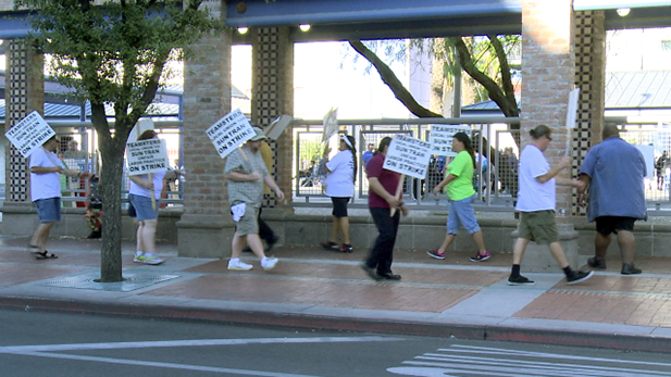 Sun Tran workers walk a picket line at Ronstadt Transit Center while on strike in August 2015.