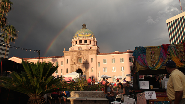 A rainbow crawls across the sky over Tucson Meet Yourself, 2016.