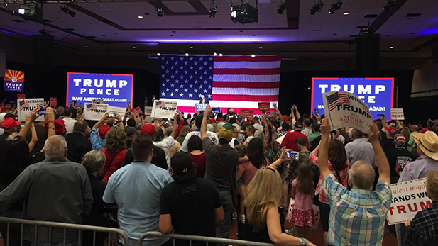 Gov. Mike Pence on the stage at the Mesa Convention Center.
