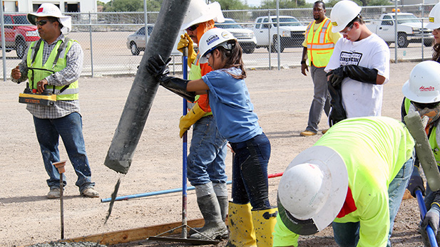 Participants working with concrete at Southern Arizona Construction Career Days, 2016.