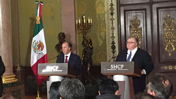 Mexican treasury secretary José Antonio Meade, left, and Agustín Carstens, governor of the Central Bank of Mexico, offered a press conference on Wednesday, Nov. 9 at Palacio Nacional, the executive's main office in Mexico City, to detail their plan to fight market uncertainty after the U.S. elections.