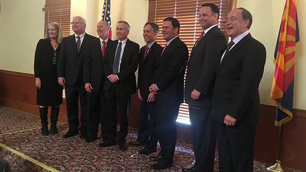 Gov. Doug Ducey with seven members of the Arizona Supreme Court following the swearing in of Justice Gould and Justice Lopez at the state capitol. Dec. 19, 2016