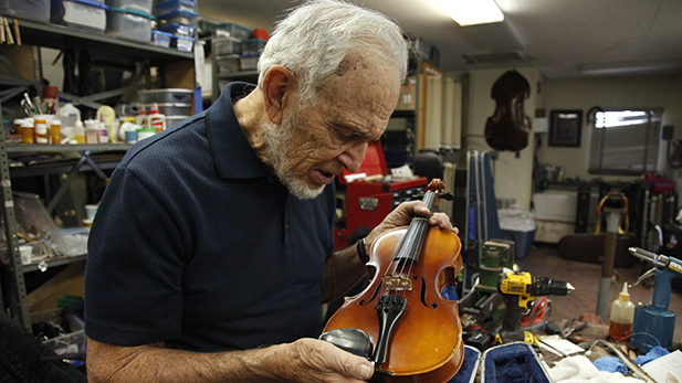 “Never saw the inside of a violin in all the years I’d played, but I saw plenty of insides," Dr. Bloomfield said. That changed when he started at the repair shop. 