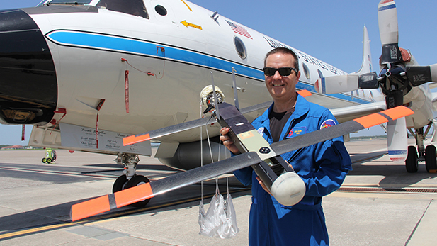 Hurricane researcher Joe Cione is leading NOAA's effort to use the Raytheon-produced Coyote unmanned vehicle with a P-3 aircraft to collect weather data to improve hurricane forecasting.