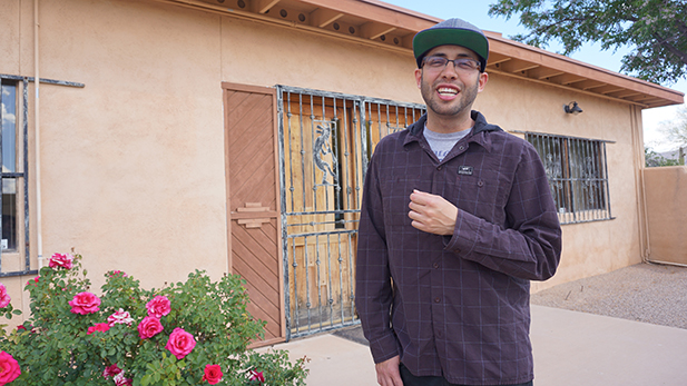 Gabriel Otero in front of his workplace, radio station KPYT.