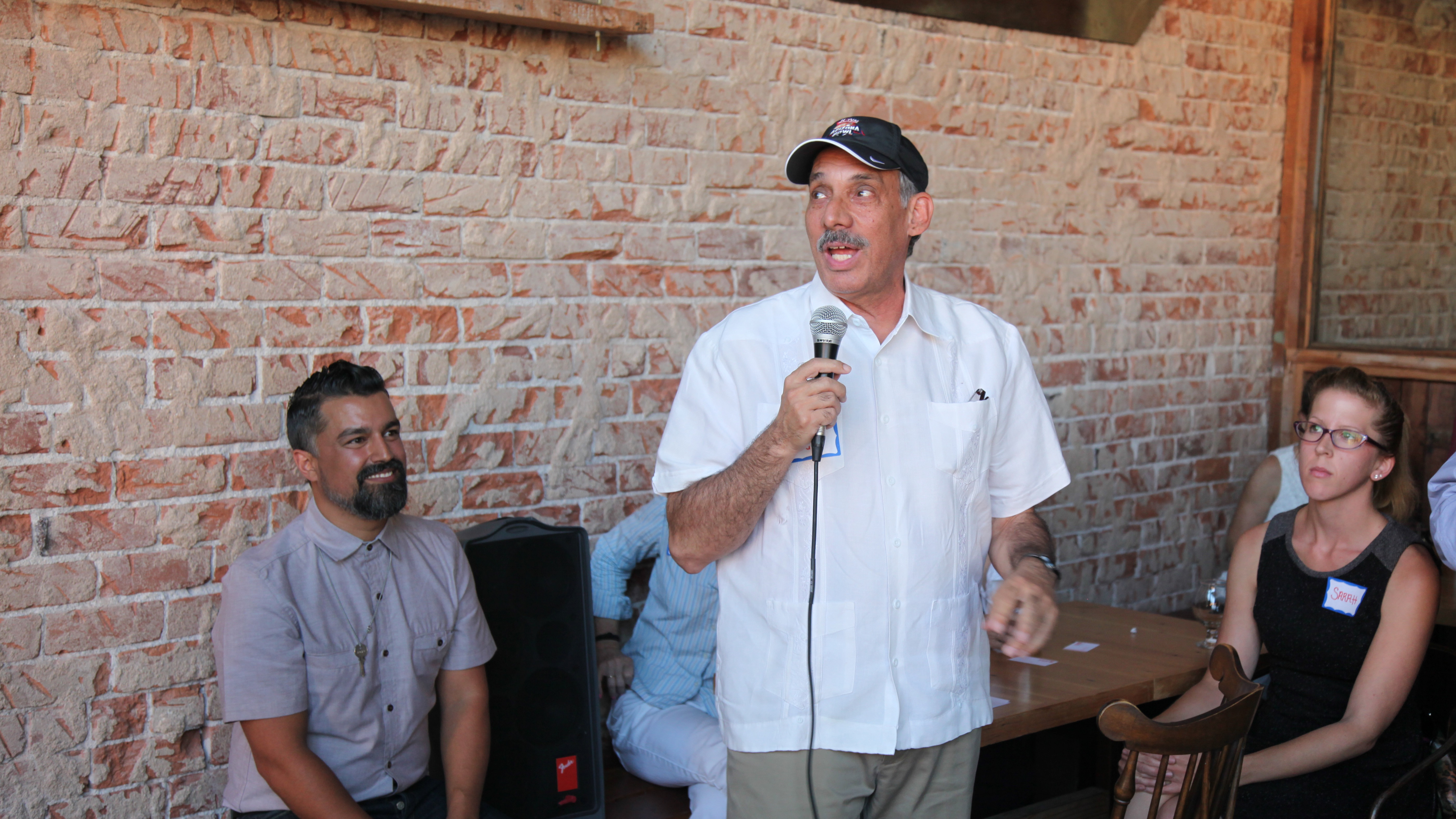 Mike Feder tells his story to the 'Failure' Night attendees. The evening's other speaker, Alok Appadurai, is seated to the left.