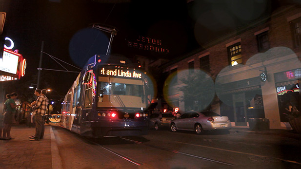 A streetcar passes by the Rialto Theatre in downtown Tucson.