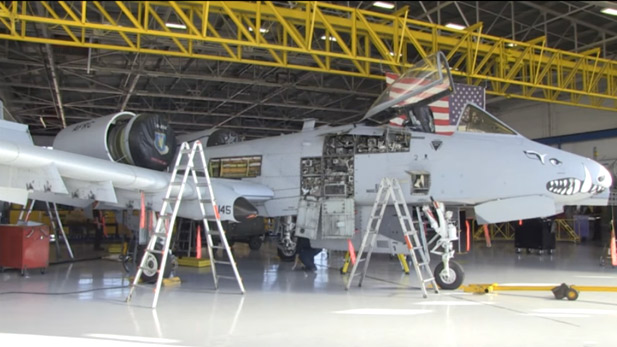 An A-10 being maintained in a hangar at Davis Monthan Air Force Base.