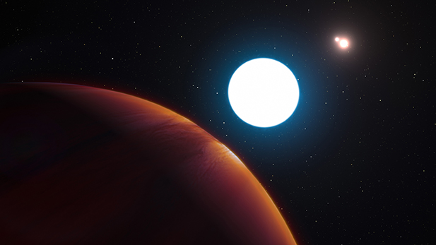 An artist's impression shows a view of the triple star system HD 131399 from close to the giant planet
orbiting in the system.