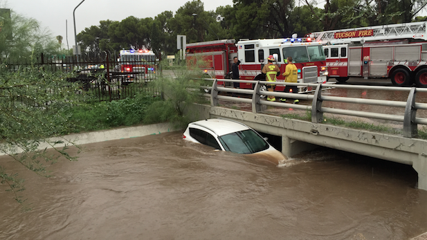 Pima County Supervisor Sharon Bronson was rescued from this car after it was washed off a road on the near north side of Tucson.