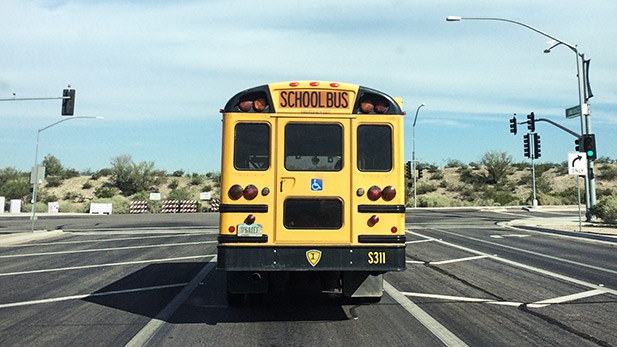 A school bus stops at an intersection on Tucson's northwest side.