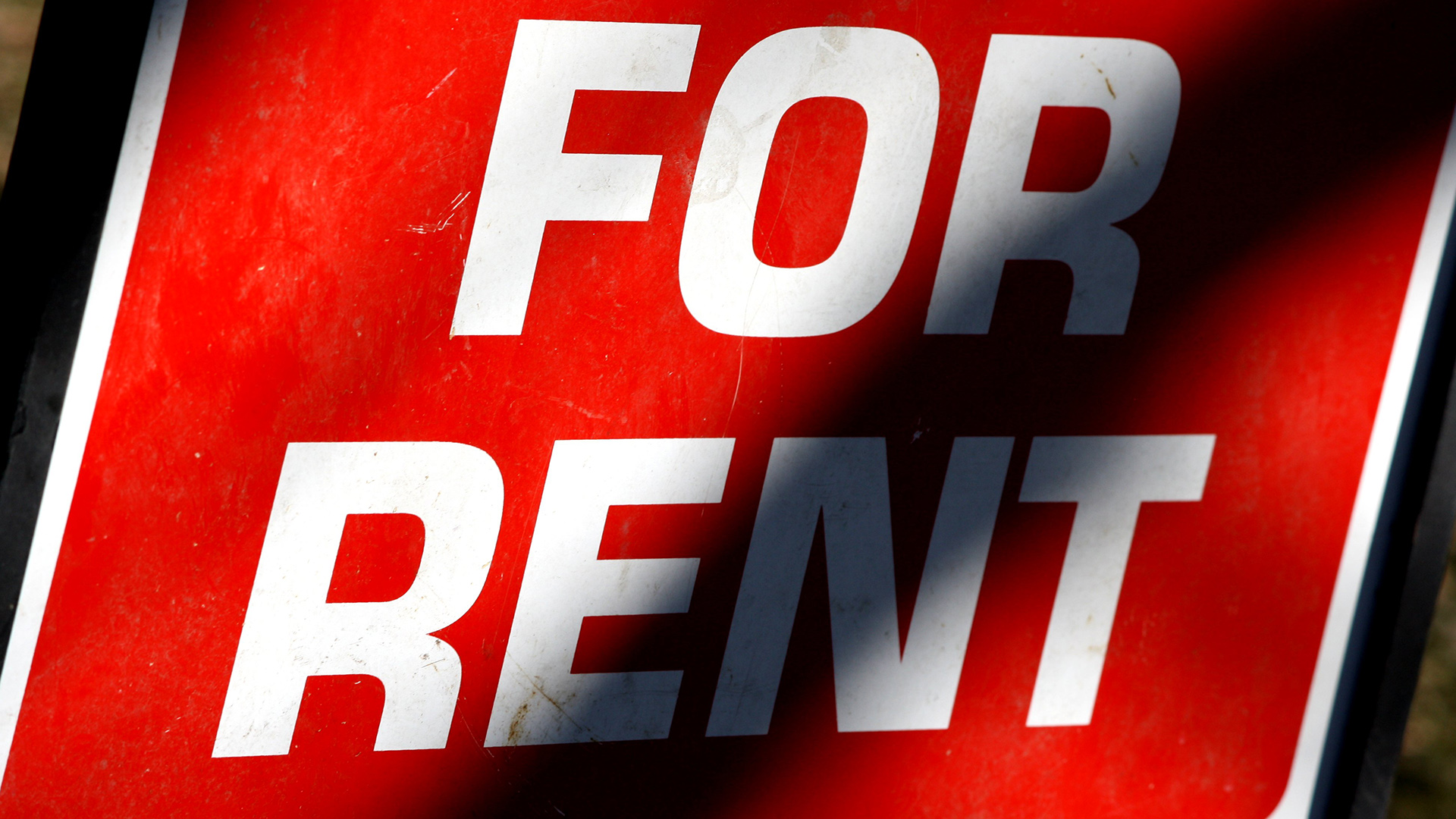 A "for rent" sign.
