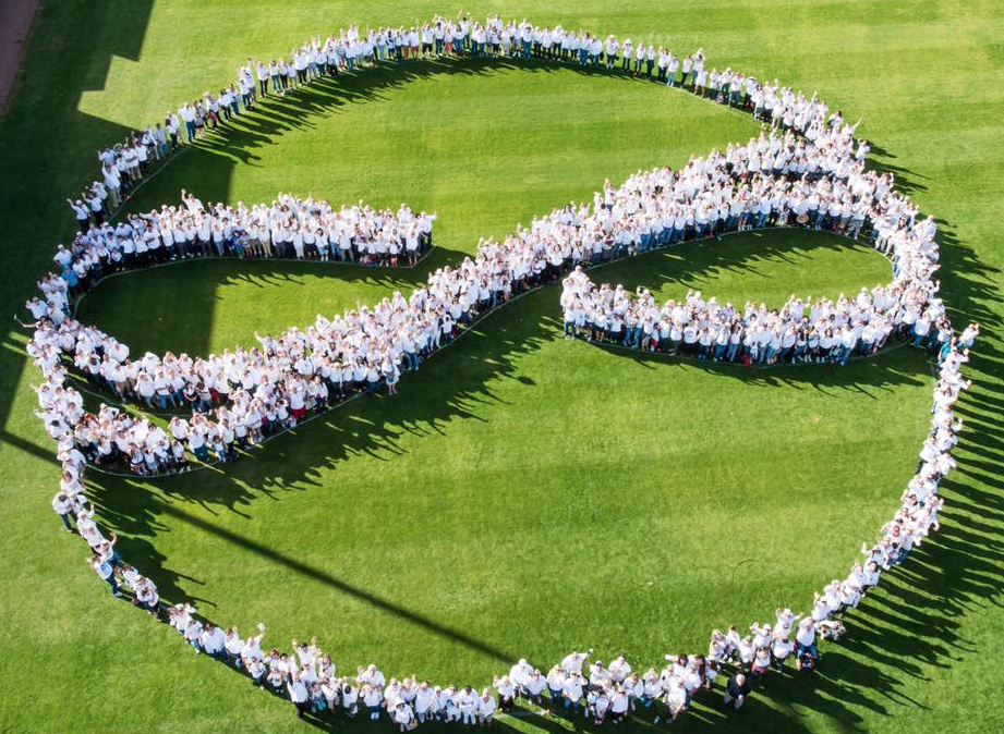 Tucsonans form an 'embrace' symbol to commeorate victims of the Jan. 8, 2011 mass shooting.