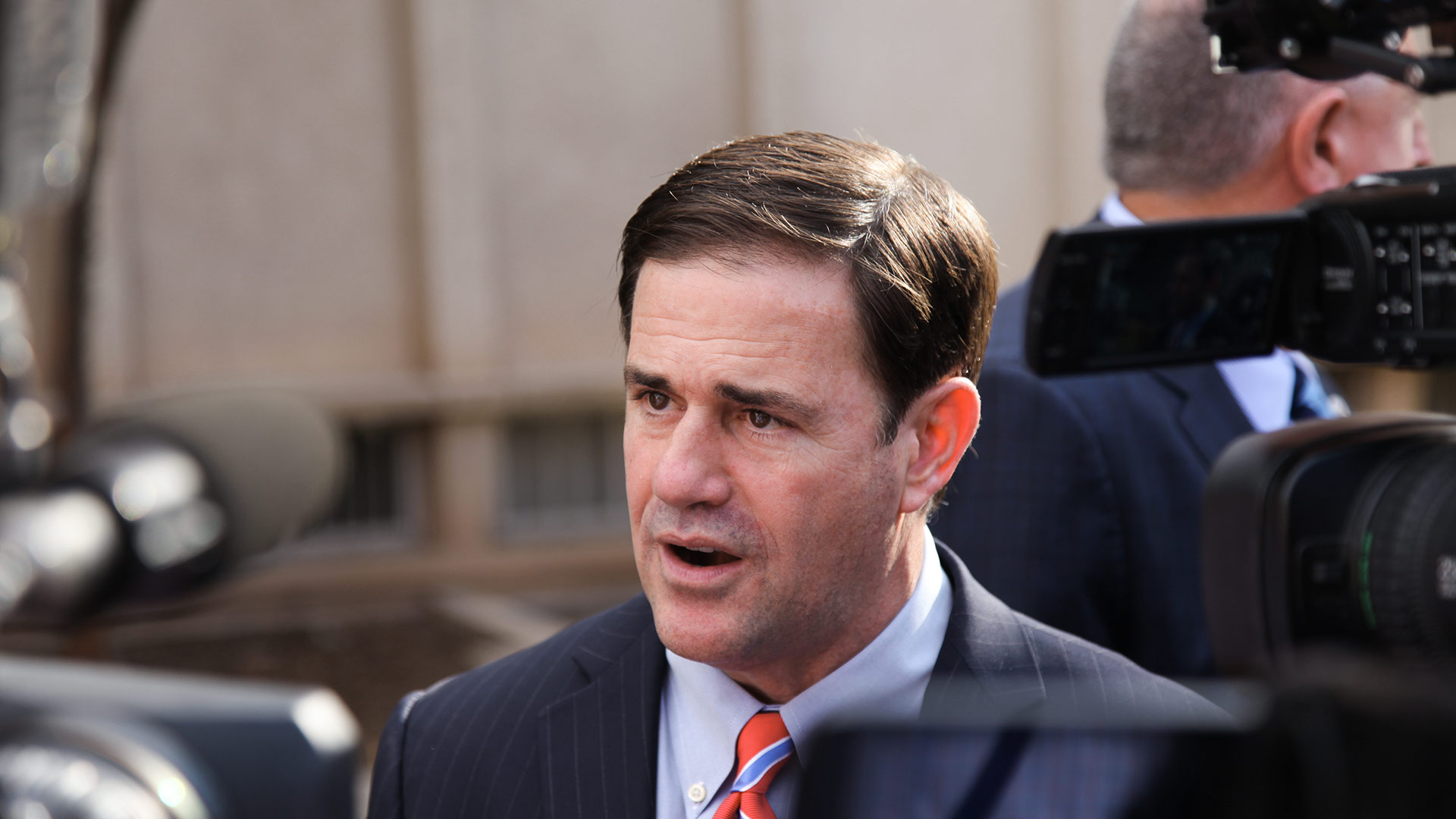 Arizona Gov. Doug Ducey speaks to members of the media Oct. 4, 2017 on the University of Arizona campus.