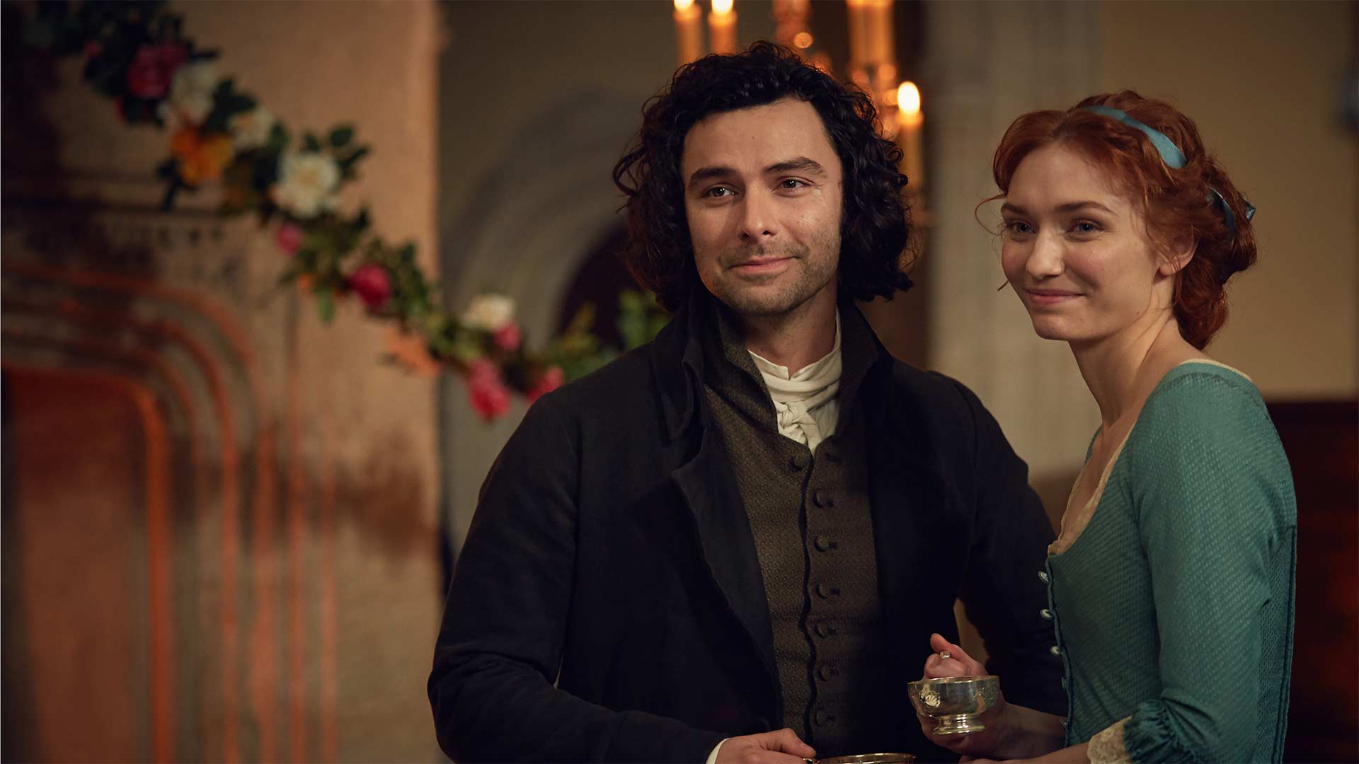 Aidan Turner as Ross Poldark and Eleanor Tomlinson as Demelza Poldark