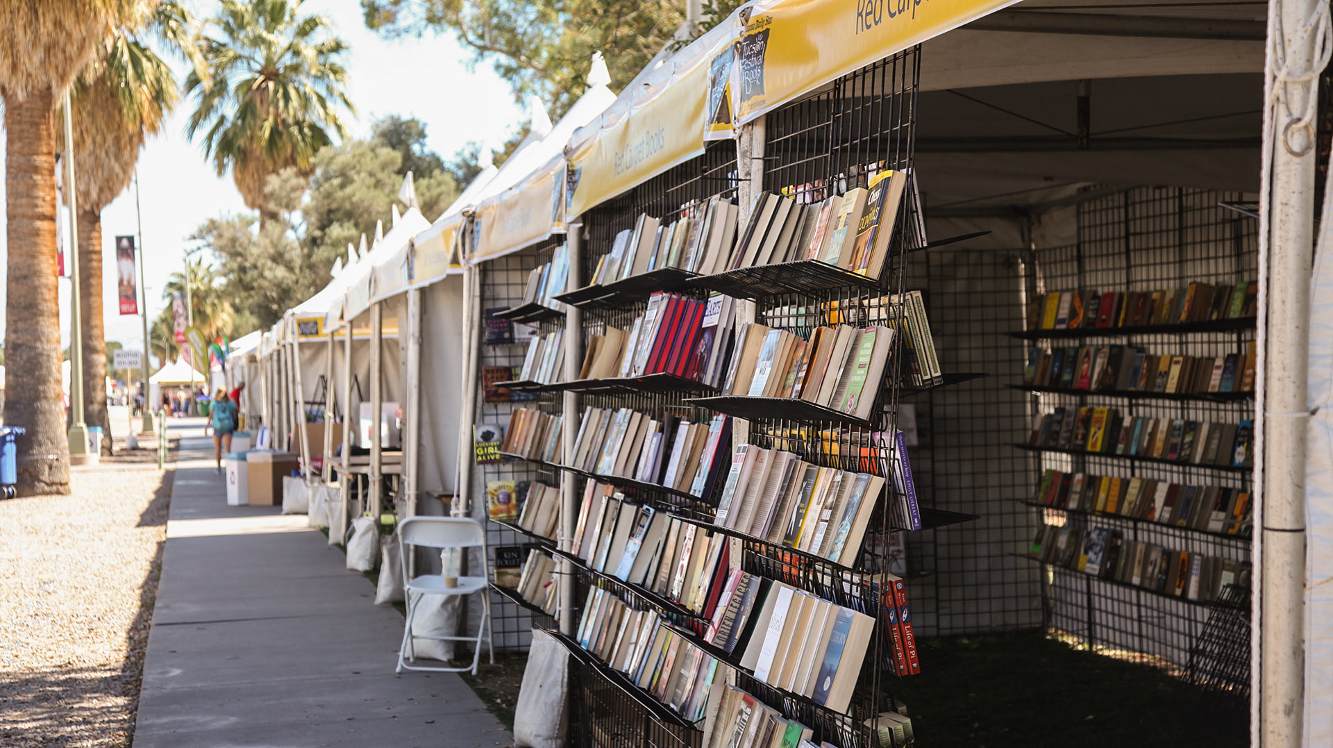 Booksellers set up in preparation for the 2017 Tucson Festival of Books. 