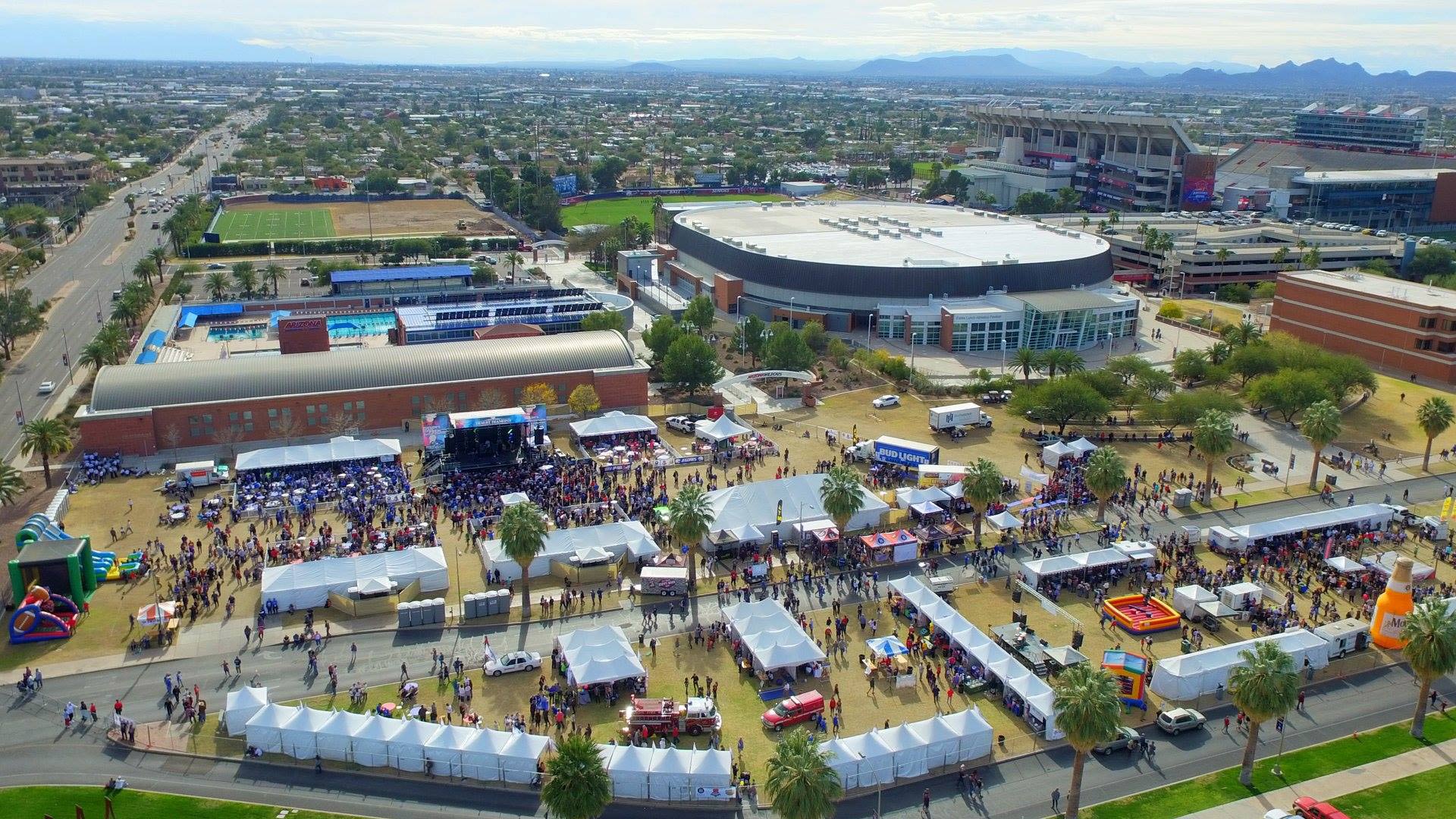 College football fans tailgate prior to 2016 Arizona Bowl at Arizona Stadium, Dec. 27, 2016.