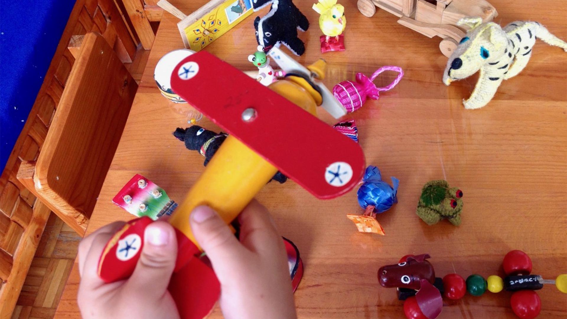 A child playing with toys.