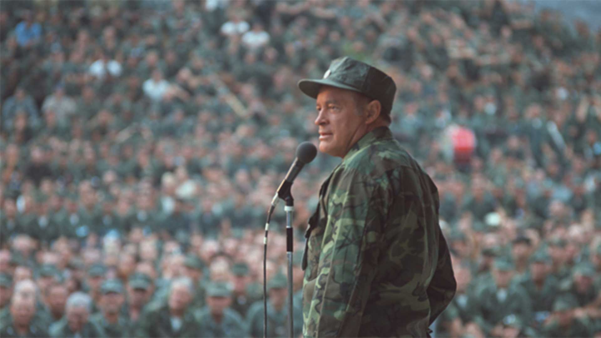 Bob Hope on stage entertaining the troops in Vietnam.