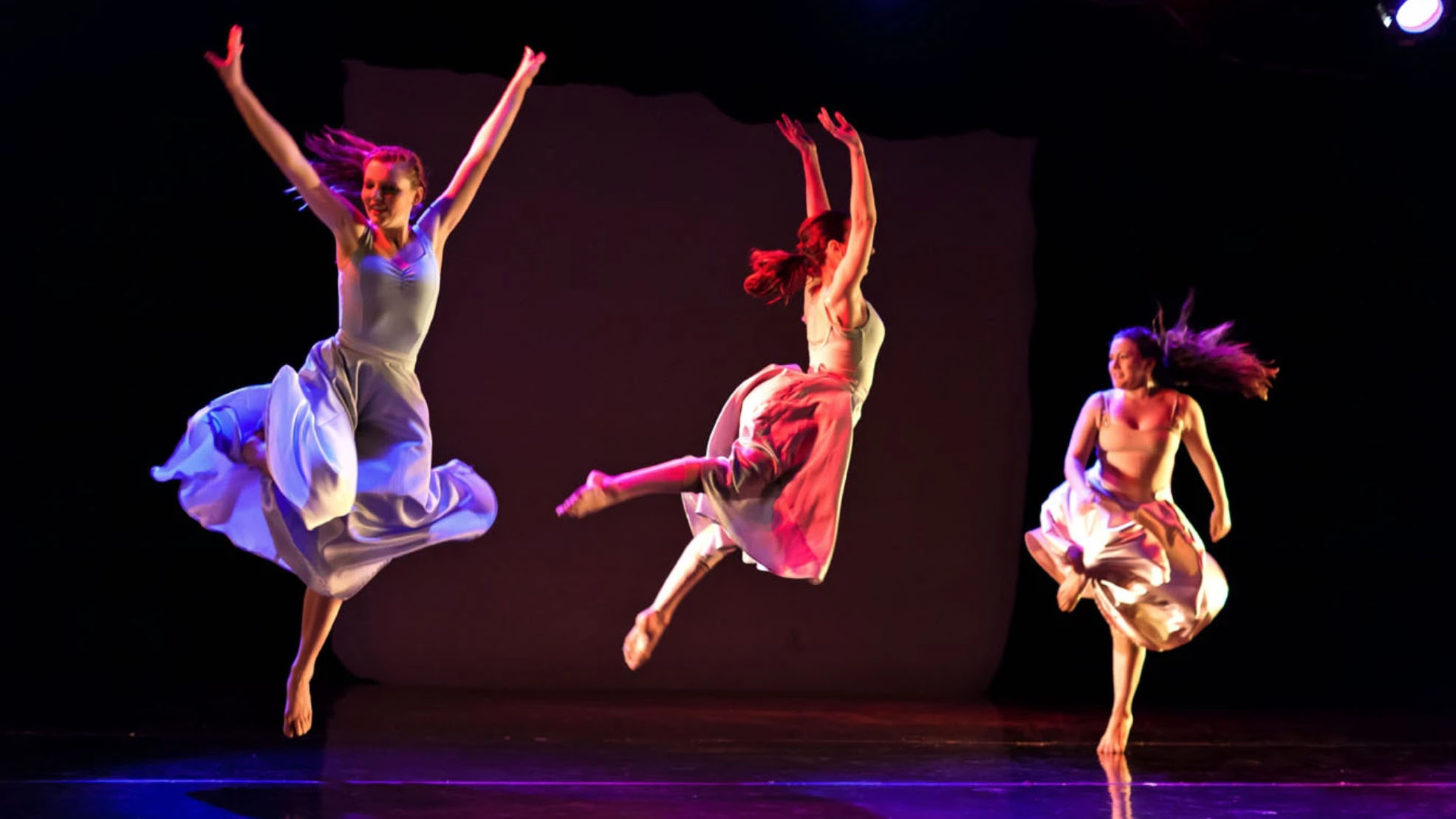 Safos Dance Theatre performers Yvonne Montoya, Caroline Gaujour, and Grace Rhyne.