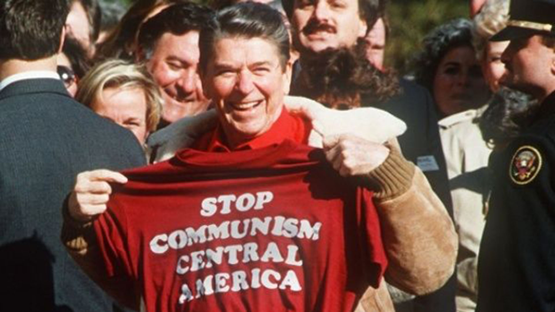 Reagan holds up t-shirt