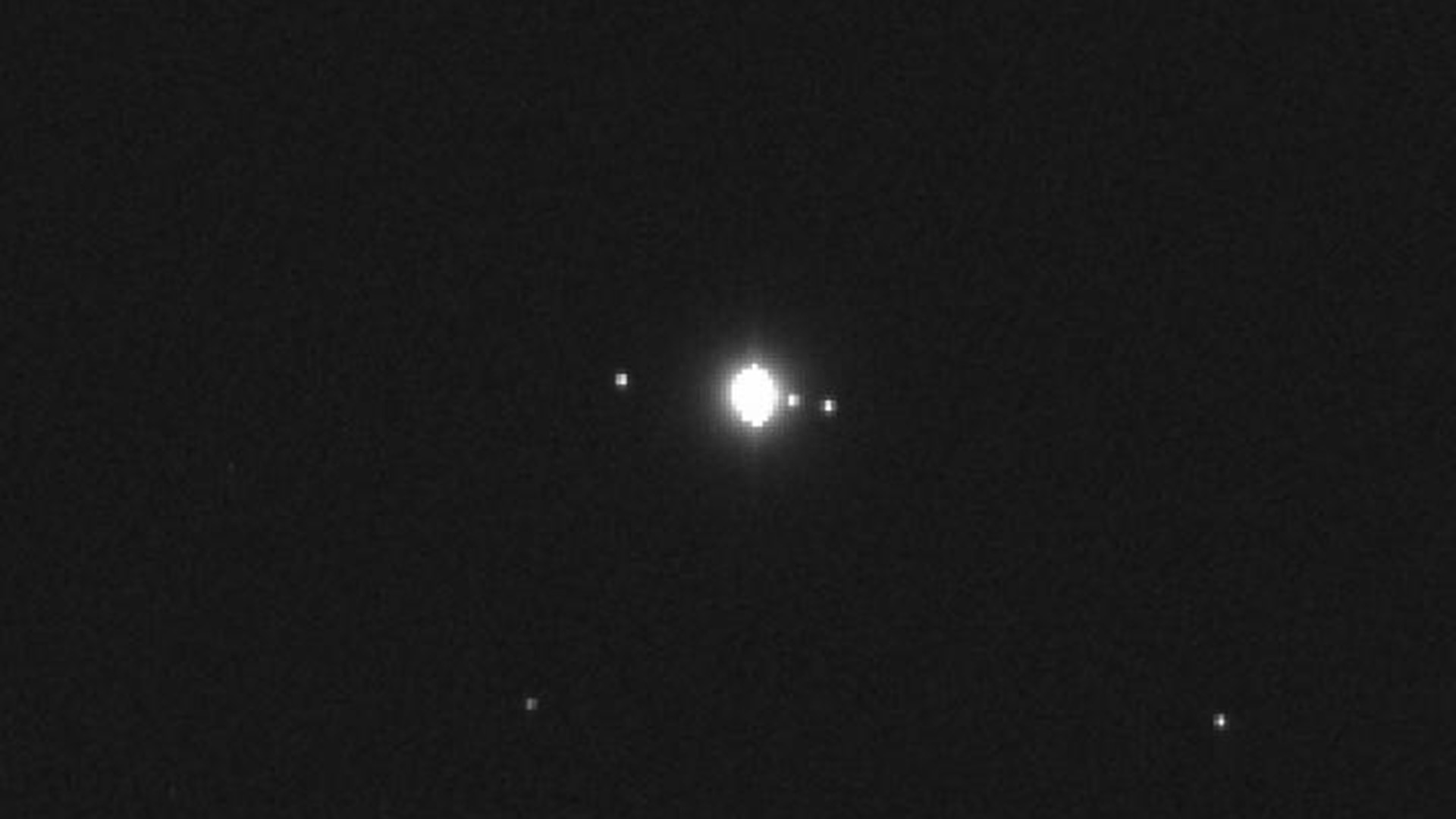 An image of Jupiter taken by OSIRIS-REx, 75 million miles from Earth and 419 million miles from Jupiter. With an exposure time of two seconds, the image renders Jupiter overexposed, but allows for enhanced detection of stars in the background.