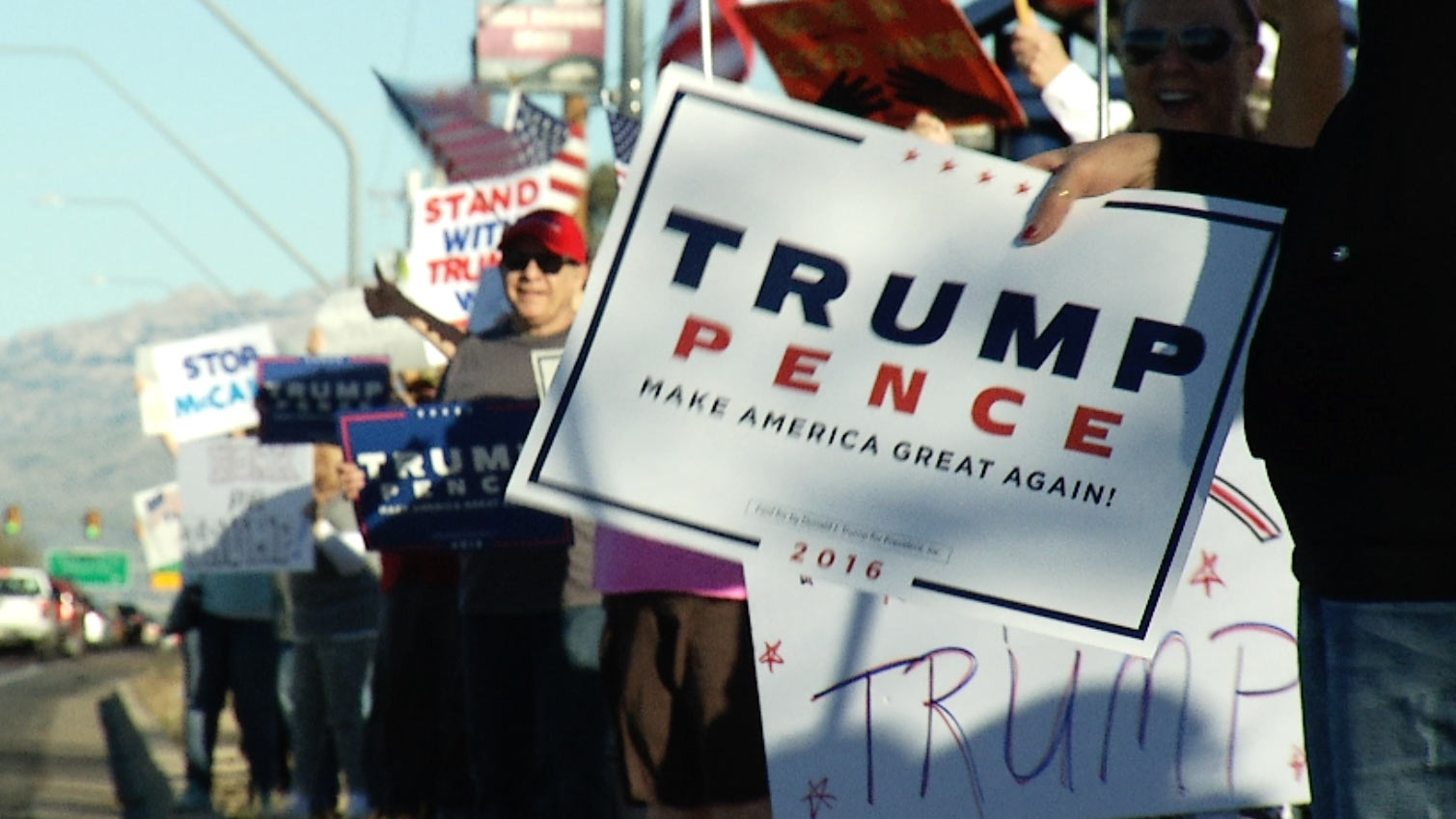 Supporters of President Trump rally along Tucson's Tanque Verde Road, Feb. 22, 2017.