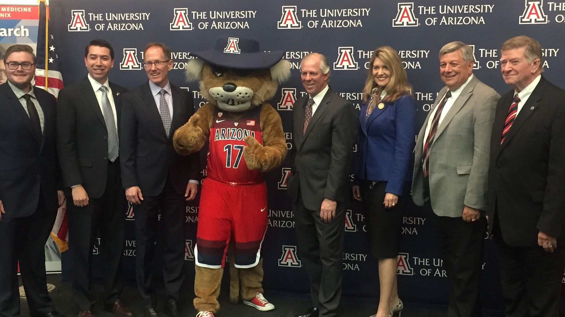 Robert Clayton Robbins, fourth from the right, poses with the University of Arizona mascot and members of the Arizona Board of Regents at the press conference announcing the vote to make him a finalist for UA president.