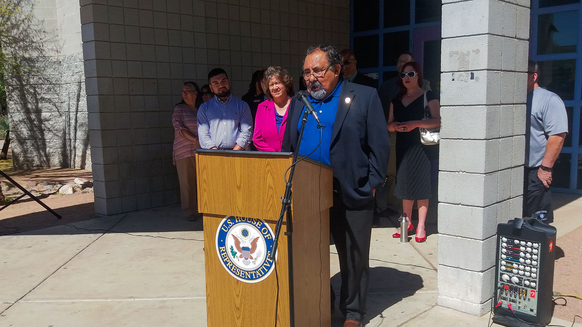 U.S. Rep. Raúl Grijalva speaks in front of El Pueblo Library in Tucson in support of funding for public libraries, facing cuts under a proposal from President Donald Trump.