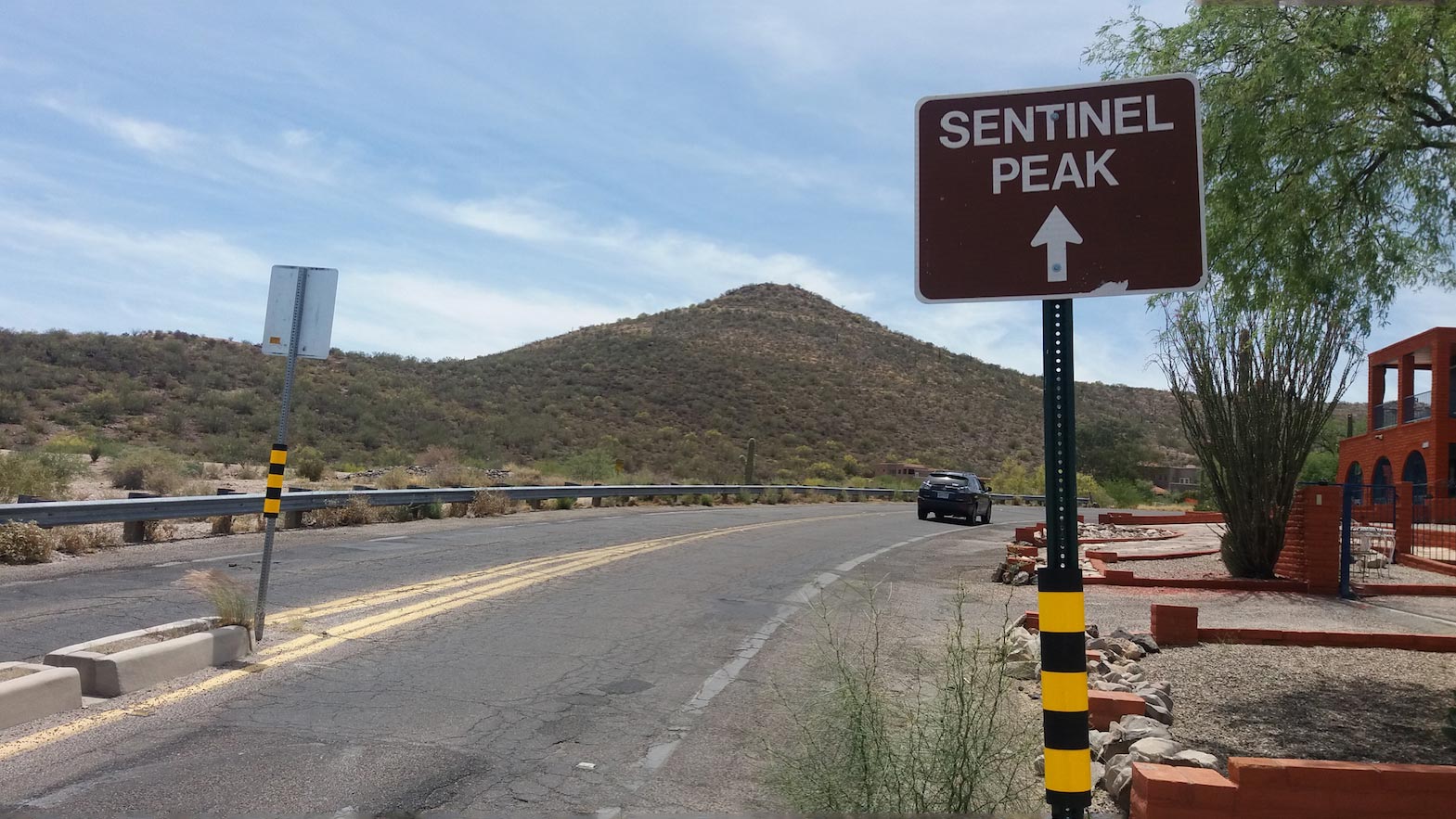 Sentinel Peak Road, accessed from West Congress Street, climbs and encircles "A" Mountain.