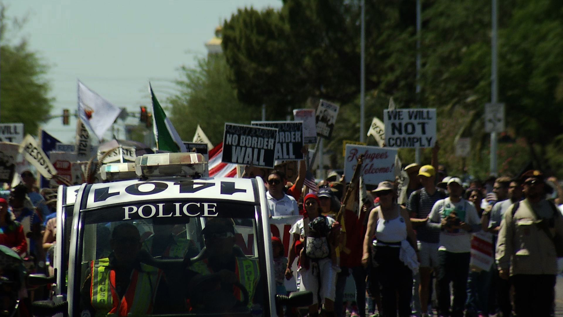 Three hundred demonstrators marched from Tucson's south side to Armory Park, May 1, 2017.