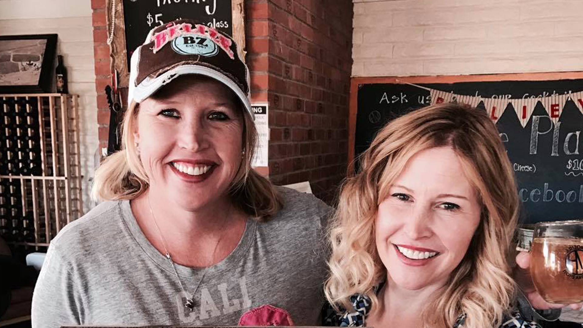 Megan Haller (left) and Shannon Zouzoulas (right) are sisters and owners of Arizona Hops and Vines winery in Sonoita.