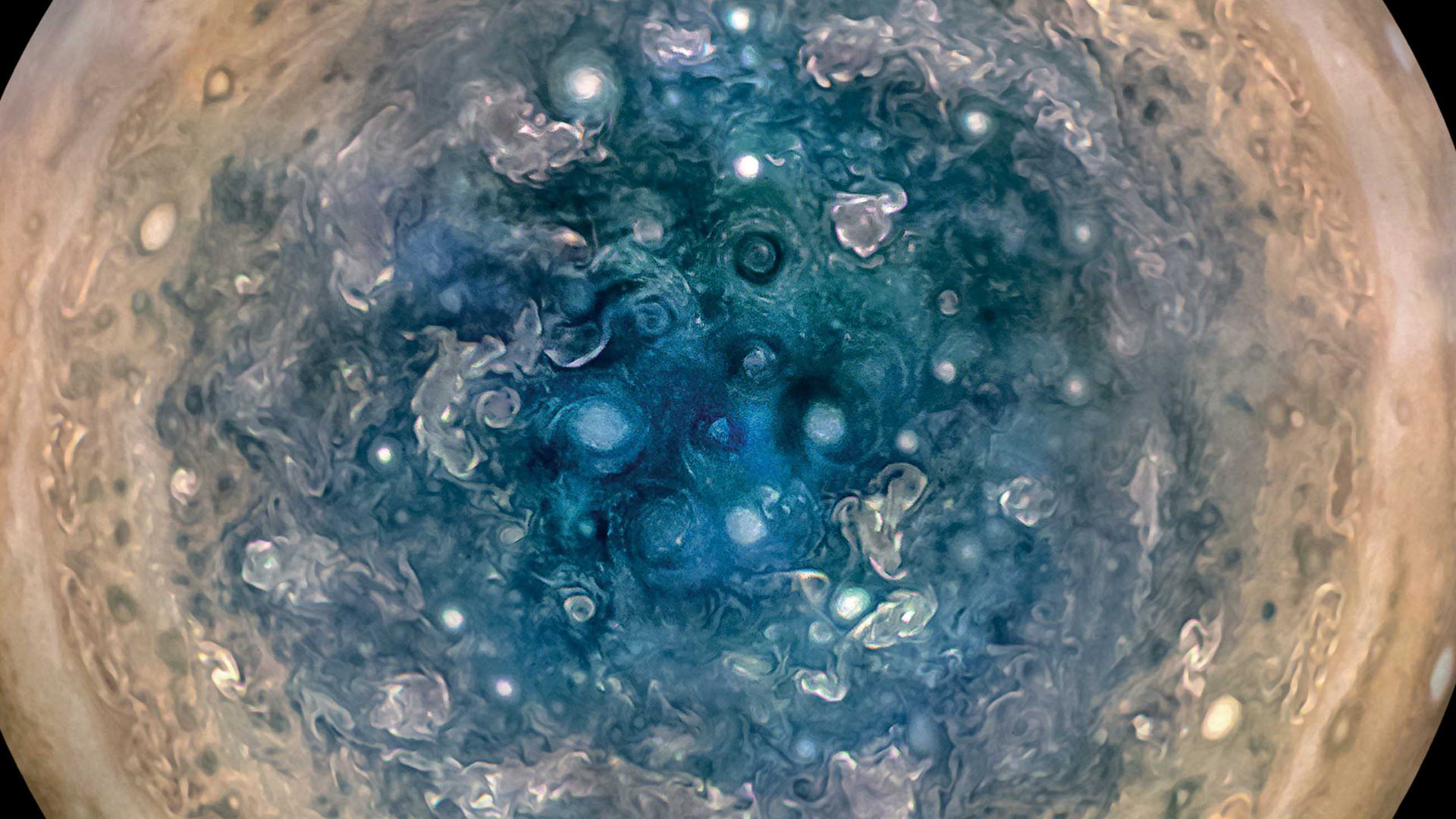 Jupiter’s south pole, as seen by NASA’s Juno spacecraft from an altitude of 32,000 miles. The oval features are cyclones.