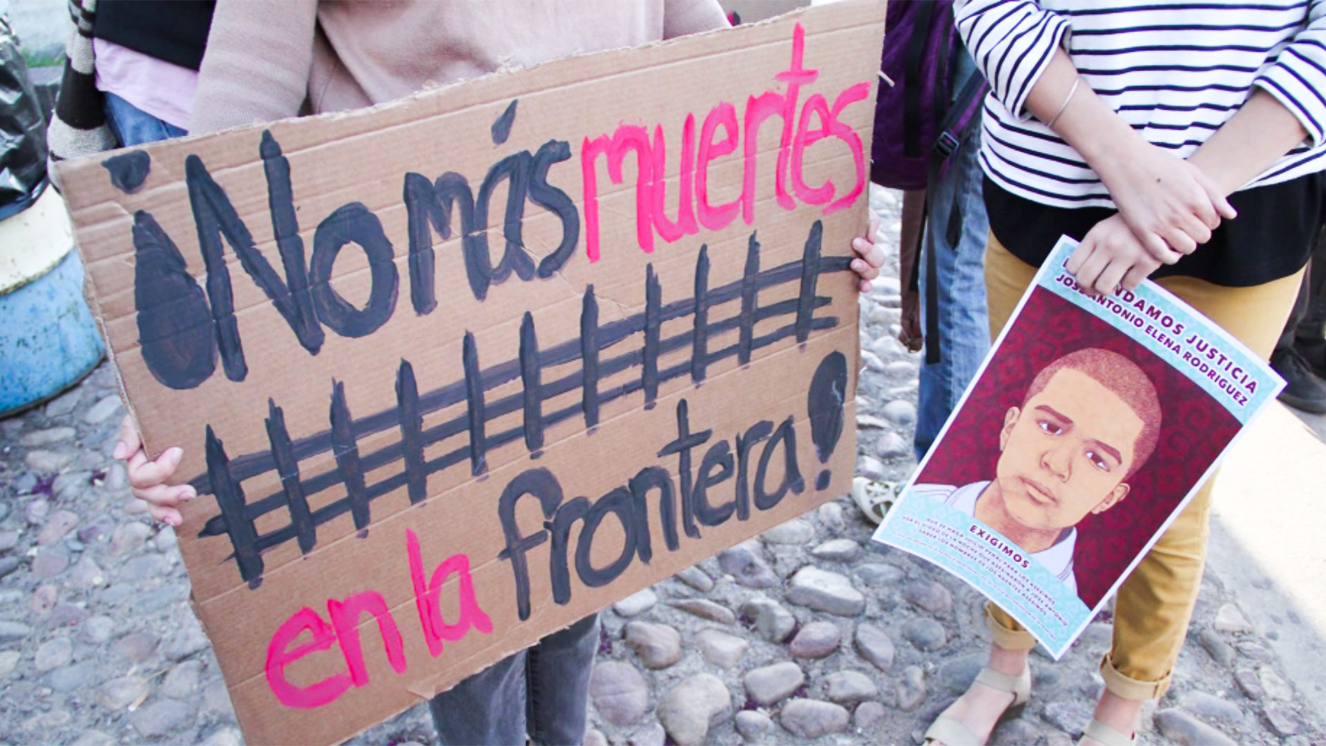 Signs held at an April 2013 protest over the death of Jose Antonio Elena Rodriguez.