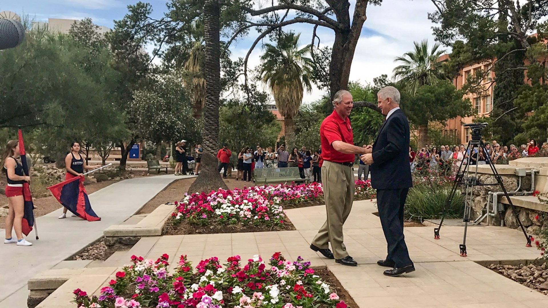 University of Arizona Provost Andrew Comrie, right, greets Robert C. Robbins on Robbins' first day as UA president, June 1, 2017.