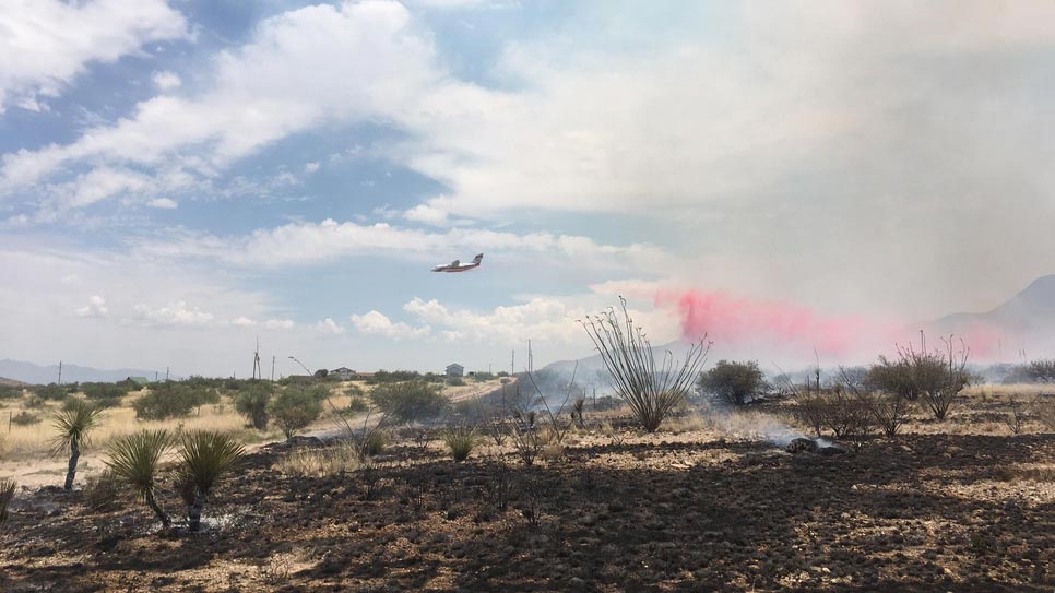 Plane drops retardant on the Lizard Fire, burning near Cochise Stronghold in Southeastern Arizona June 9, 2017.