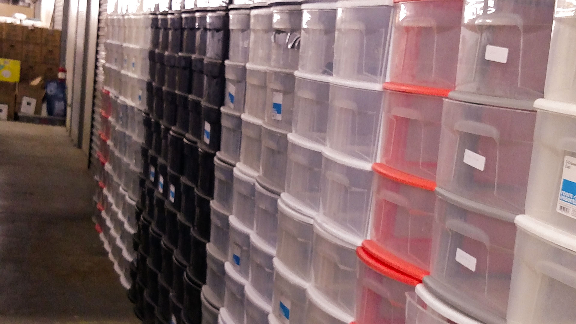 Bins stacked at a warehouse where University of Arizona students were sorting through things left behind when the school year ended, 2017.