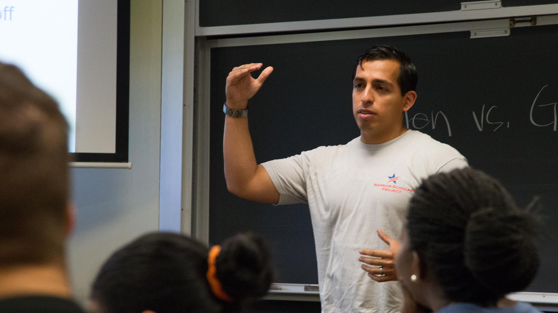 Frankie Burgos, staff member of the Warrior-Scholar Project, teaches a class.