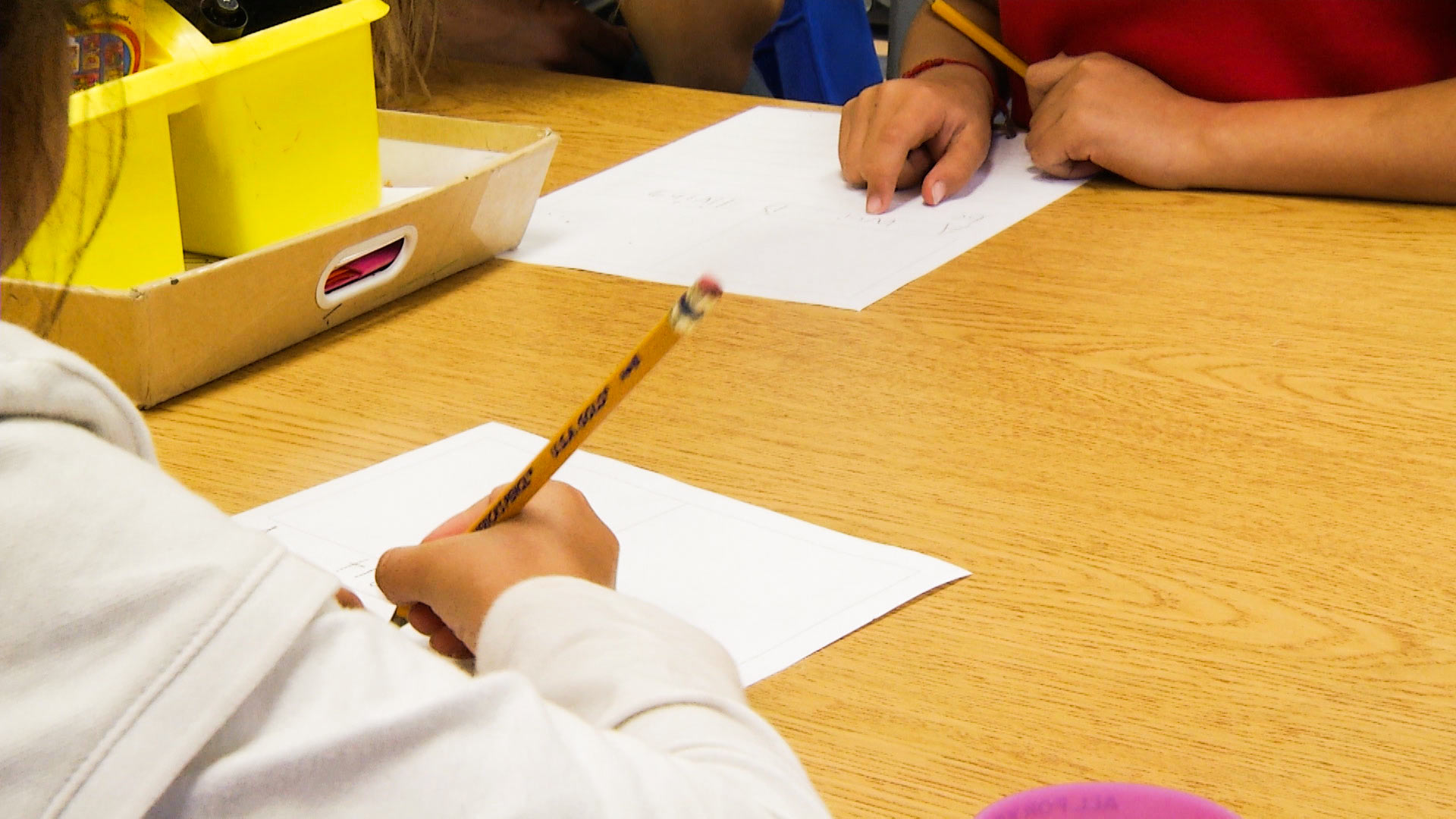 Kids practice their writing in school.
